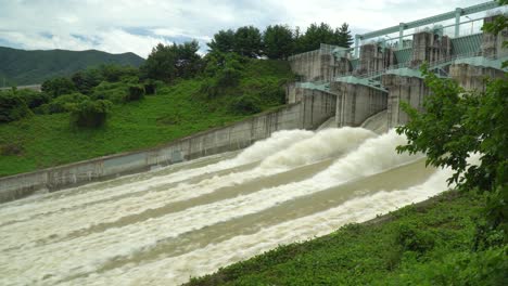 spillway of dam in south korea releasing water overflow from reservoir, static