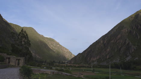 the mountains surrounding the main road entering ollantaytambo in peru's sacred valley