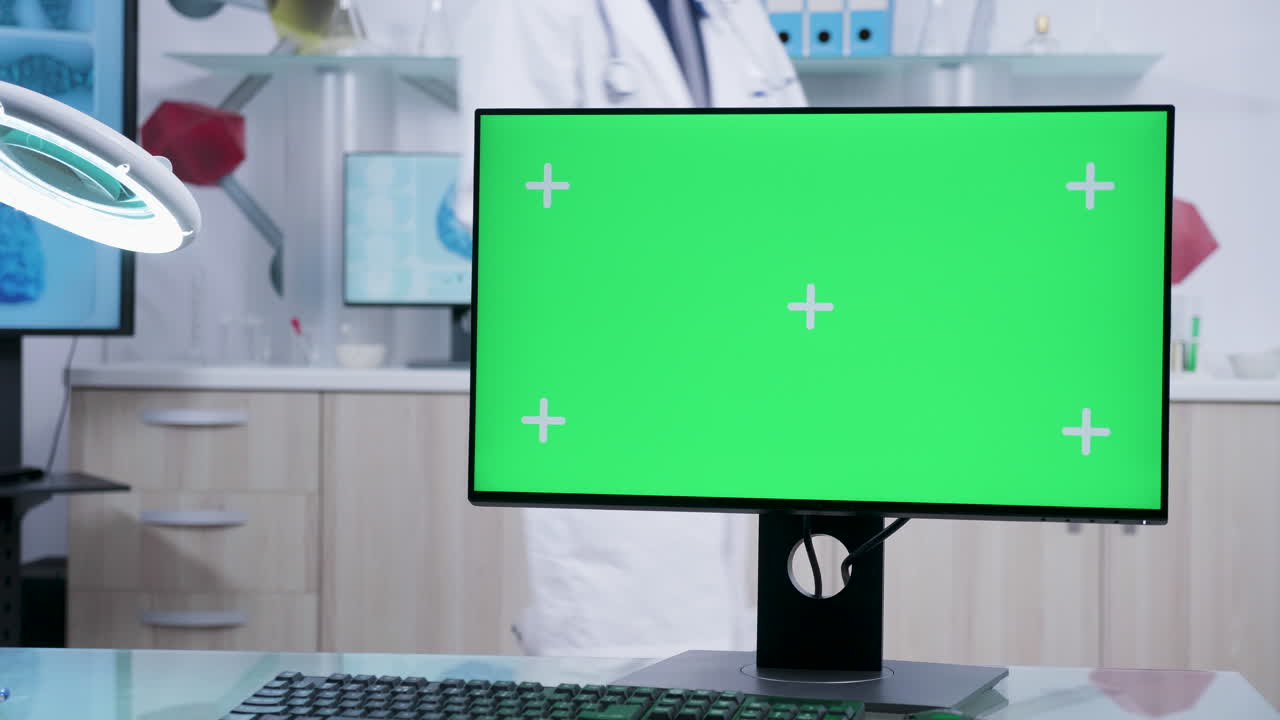 Medical laboratory with green screen monitor