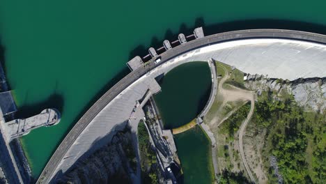 drone bird eye view of the two sides of a dam in summer