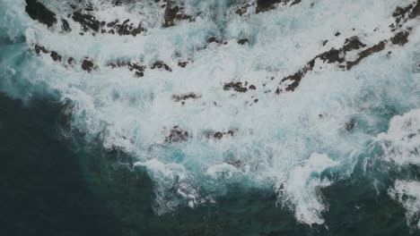 Dangerous-Ocean-waves-hits-the-rocks---topshot-aerial-drone-footage