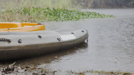 kayak, rain and nature with adventure