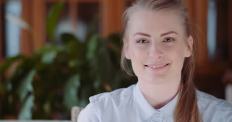 positive woman showing thumbs up