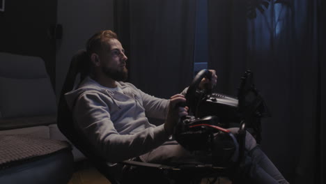 man playing racing video game