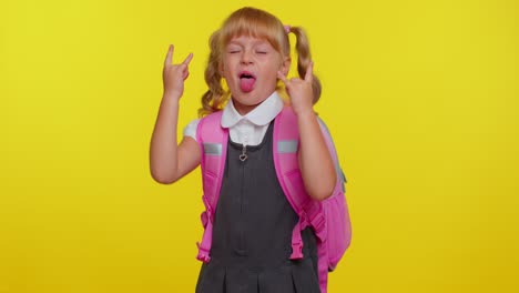 Overjoyed-funny-pupil-school-girl-showing-rock-n-roll-gesture-by-hands,-cool-sign,-crazy-expression