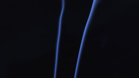 blue smoke on black background