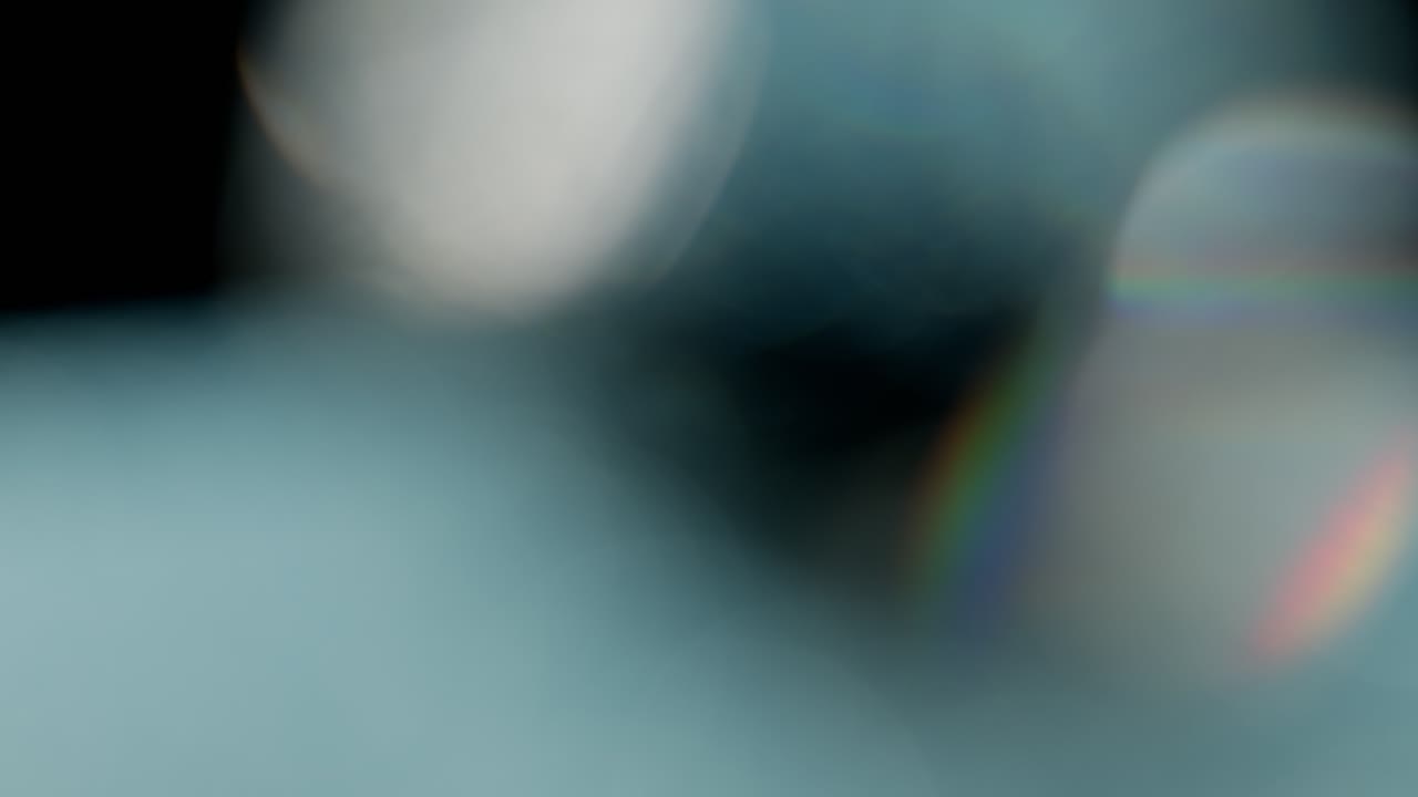 Multicolored light leaks 4k footage on black background, lens studio flare leak burst overlays