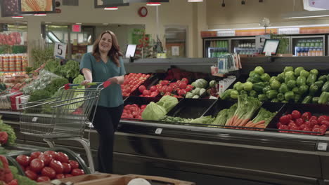 a woman shopping for fresh produce in a supermarket