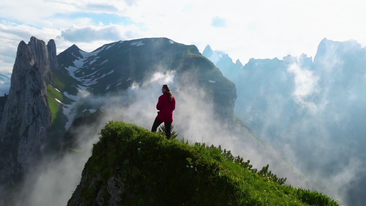 Woman Hiking in the Swiss Alps