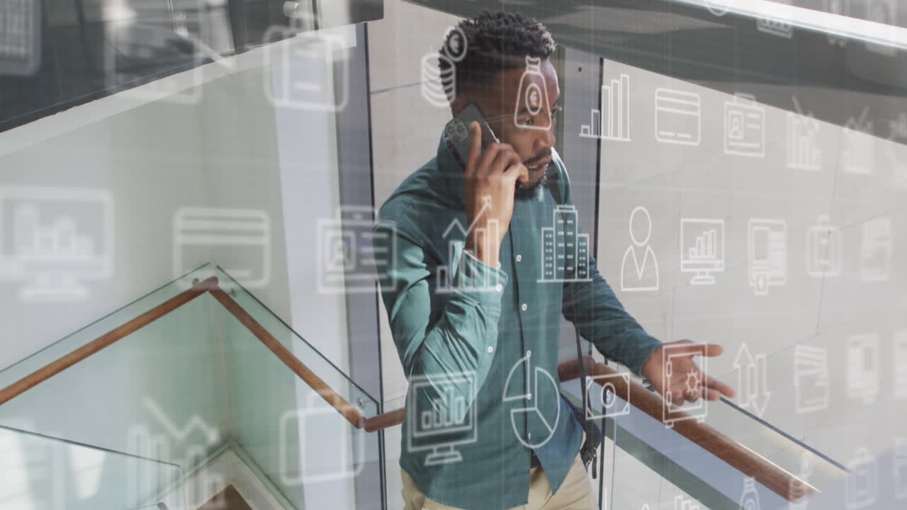 animación de iconos y procesamiento de datos sobre empresario afroamericano en la oficina