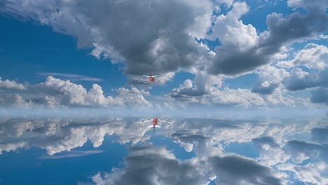 private airplane flying over clouds: aerial view of a small jet plane during a flight over the ocean, video loop