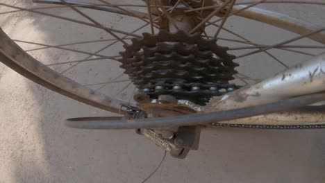 rusty cycle bike gears back weel go pro-shot in sunlight long shot