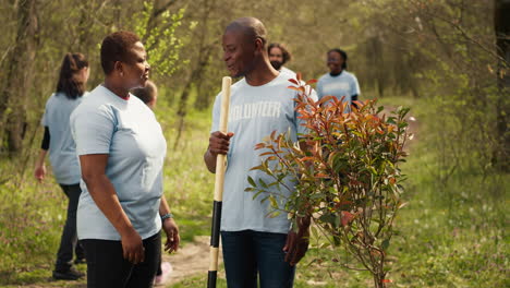 Portrait-of-african-american-couple-fighting-to-preserve-natural-environment