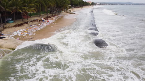 breakwater tubes used on beach to counter coastal erosion