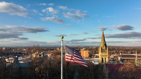 Static-aerial-of-American-USA-flag-during-dramatic-sunset