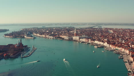 dolly forward drone shot over the lagoon towards san marco square tower