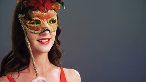 Portrait-of-beautiful-woman-wearing-masquerade-mask-4k