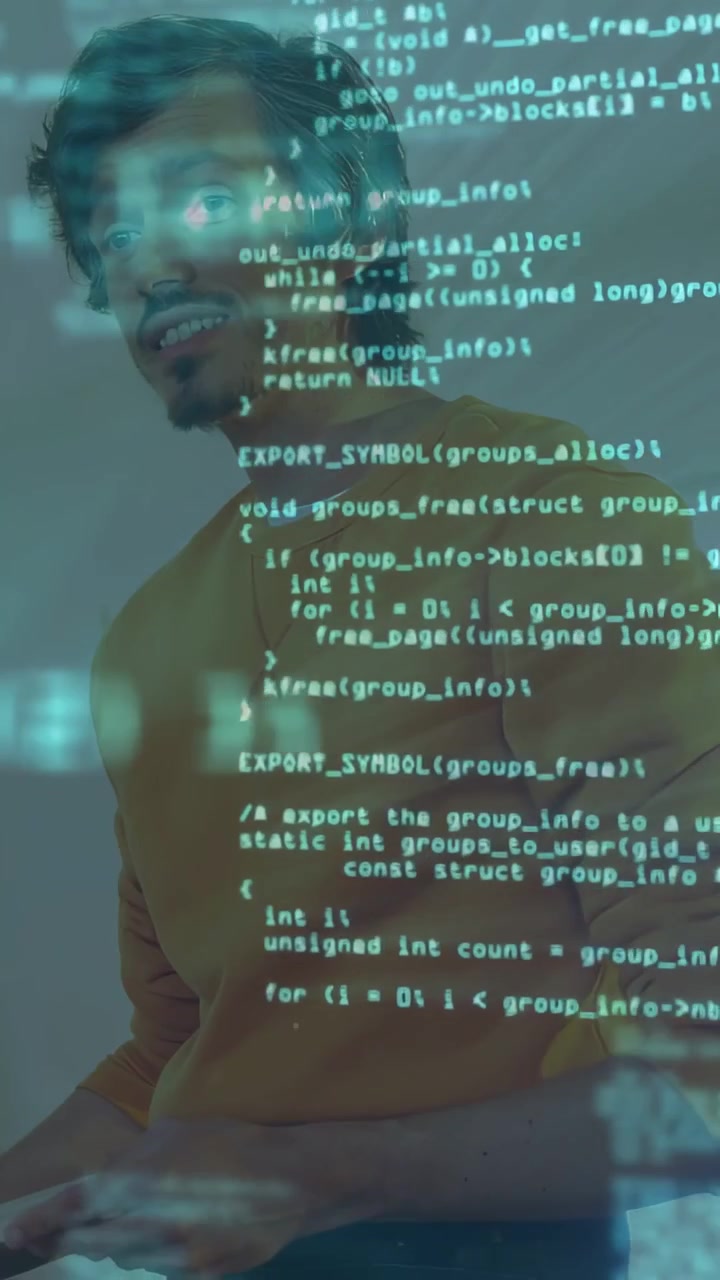 Vertical video: Dev starting speaking in tech lab, gesturing through code overlay and explaining