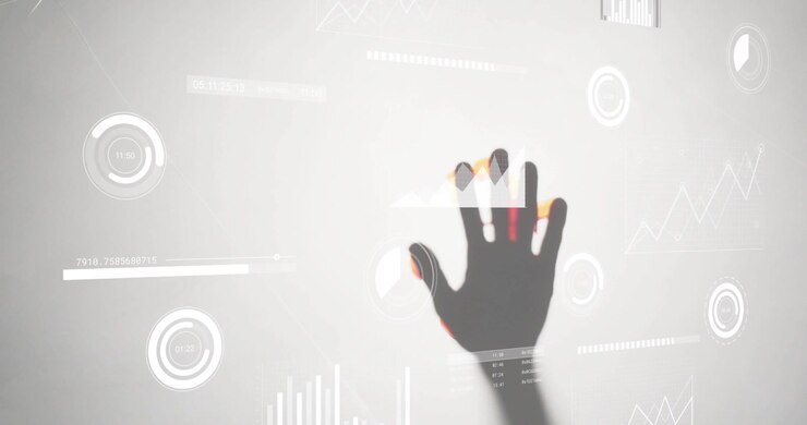 Mano a silhouette che si solleva, tocca un indicatore, preme un grafico a barre, trascina un grafico per animare i dati.