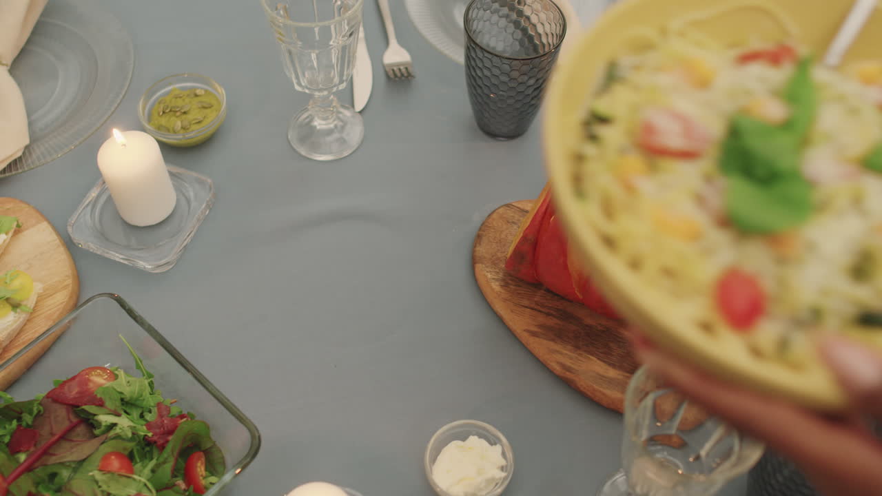 Serving Caesar Salad On Festive Dinner Table