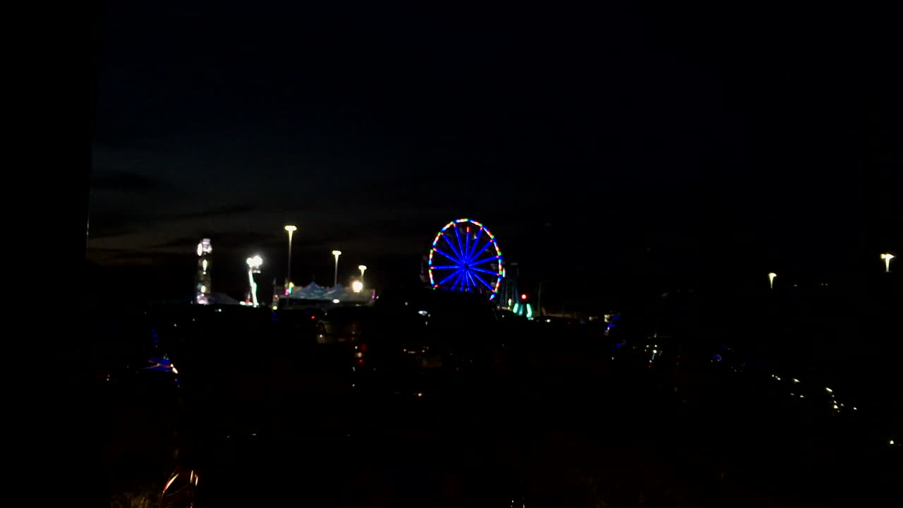 Ferris wheel in a carnival at night.