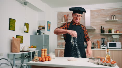 Sprinkling-on-the-table-sifted-flour