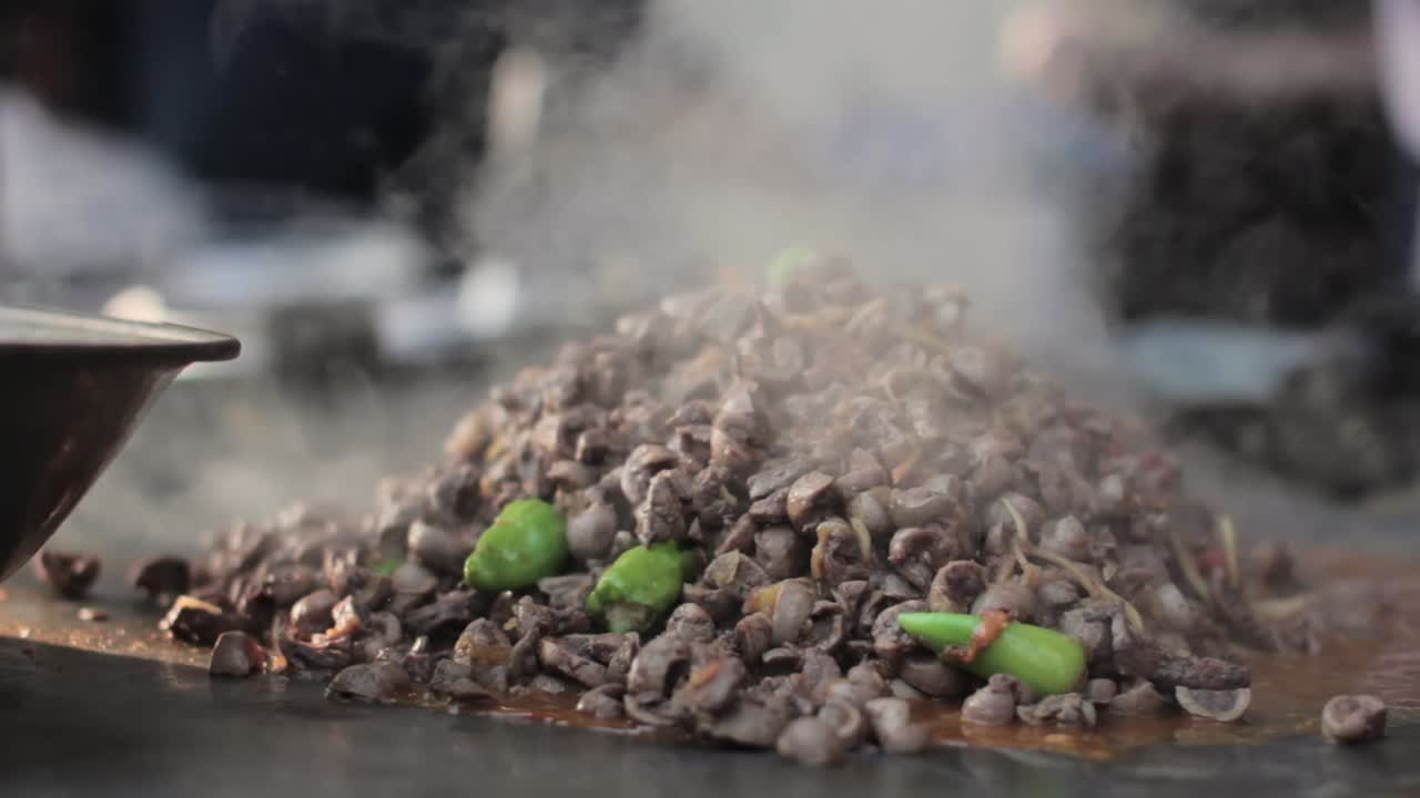 A Chef Cooks Traditional Cuisine Food In Pakistan.
