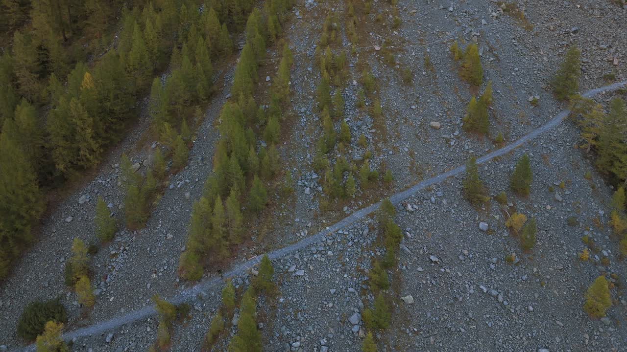Hikers Walking Through The Uphill Trail To The Lago Pirola In Valmalenco, Lombardy, Italy. - static shot