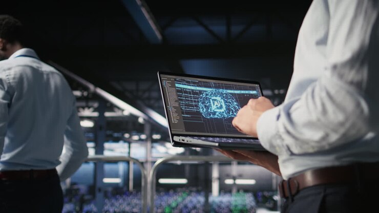 Close up of IT specialist in server room doing AI deep learning automatization