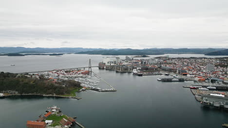 drone pullback reveals stavanger city bridge, rogaland, norway