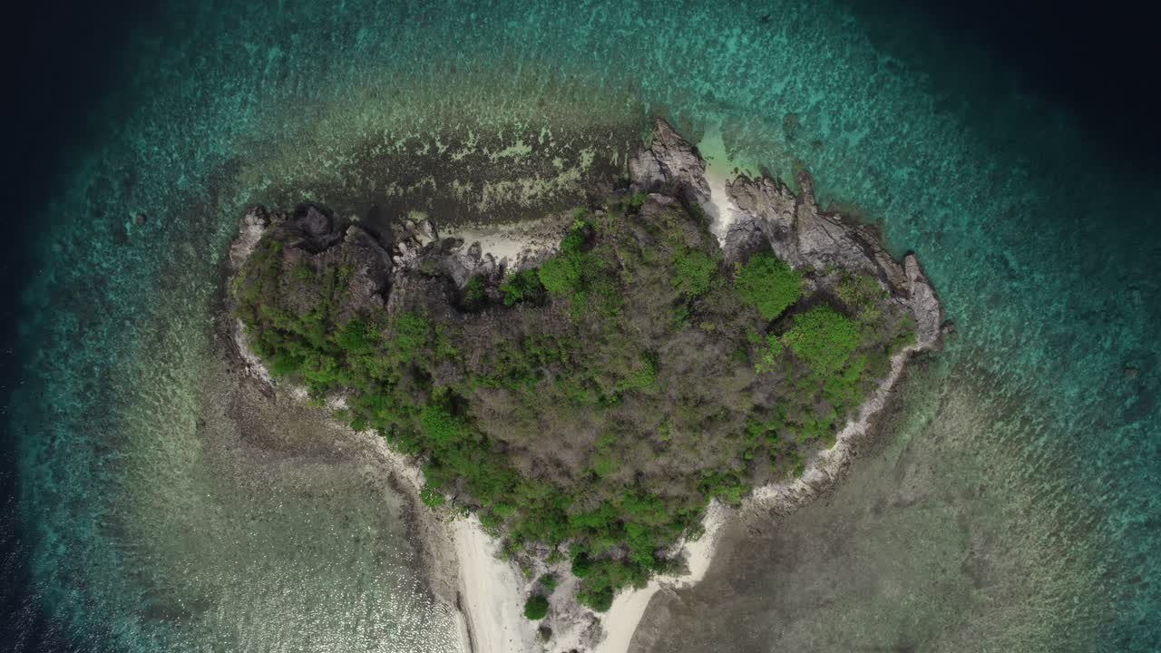 Remote island small body of land around ocean water, exotic tropical beach