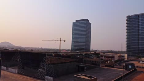 beautiful jib up of the business district in abuja, nigeria with tall skyscrapers in the background