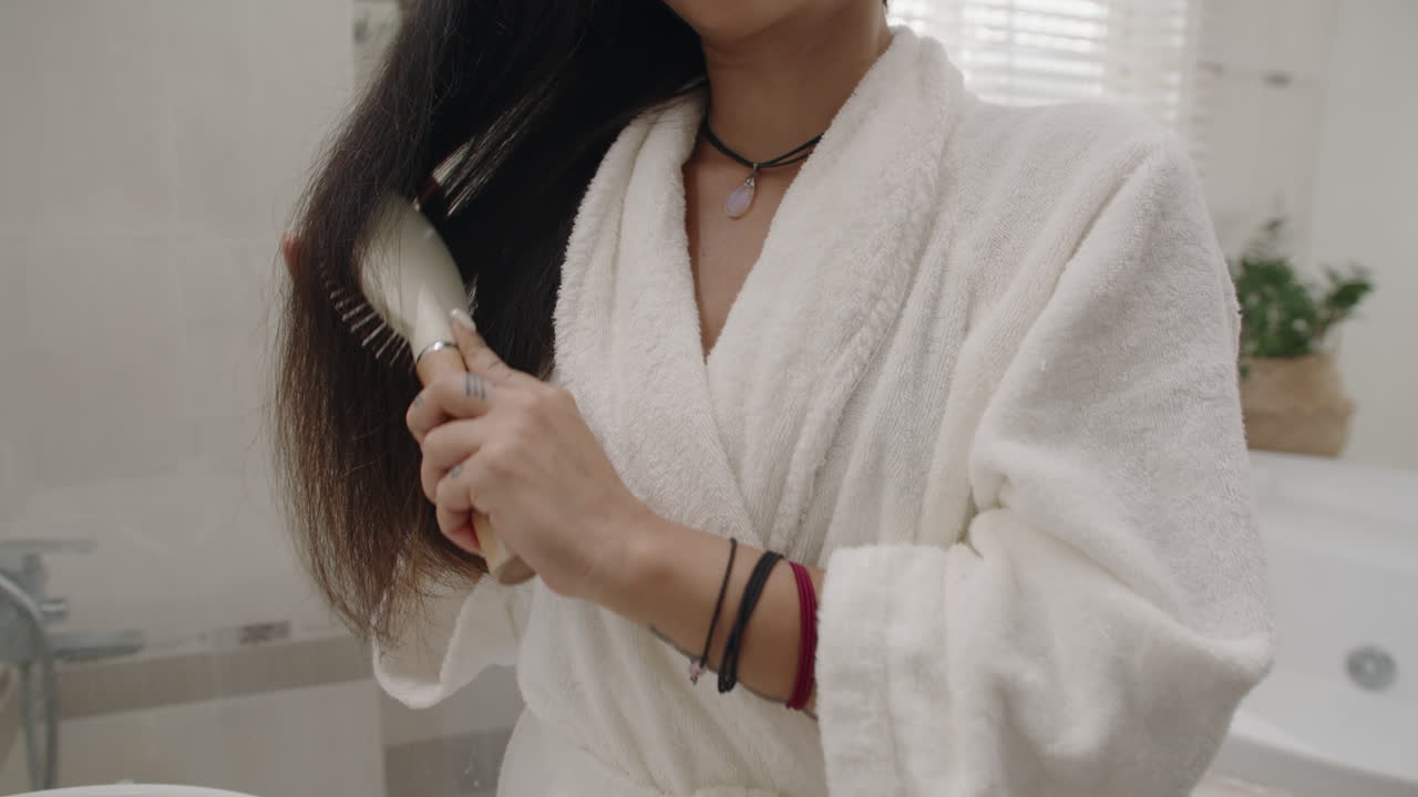 Caucasian Female Millennial Styling Hair after Bath