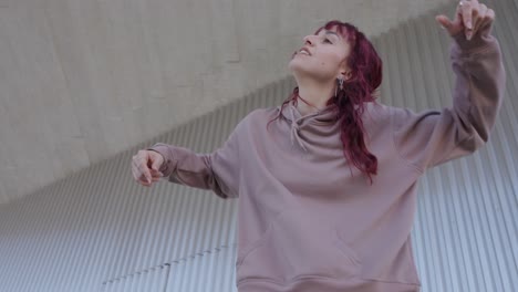 young urban dancer expressing herself in modern freestyle performance