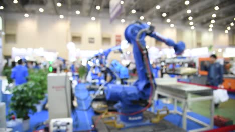 Abstract defocused robotic arms indoors