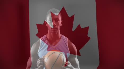 animation of flag of canad over african american male basketball player