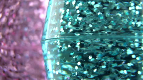 blue glitter lava lamp swirling, close up