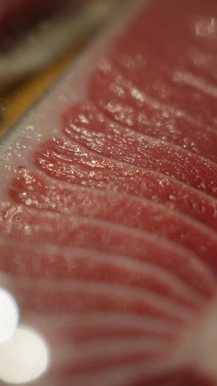 Bluefin Tuna Belly (Toro) Sashimi - Marbling Otoro (Very Fatty Tuna) With Its Rich, Buttery Texture. - vertical shot