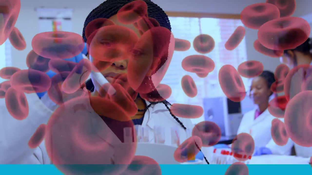 vasos sanguíneos que se mueven contra un grupo de científicos que trabajan en el laboratorio