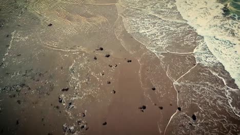 Aerial-Of-the-Tide-At-the-Beach-Of-Normandy-France-For-the-75th-Commemoration-Of-Dday-2019