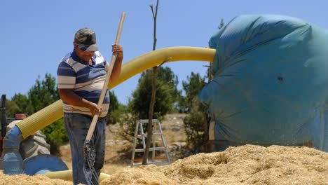 Hay-sprayer-adult-farmer