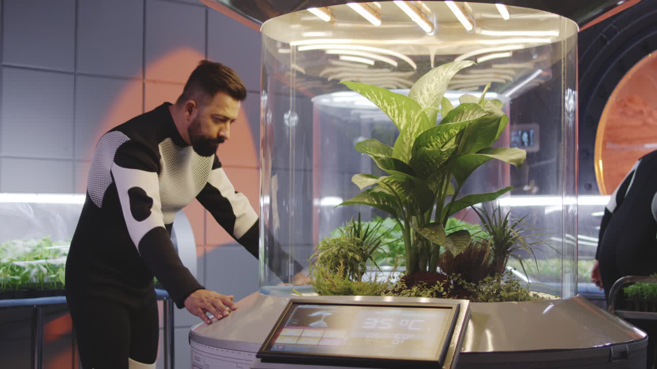 Space Greenhouse with Scientists Growing Plants