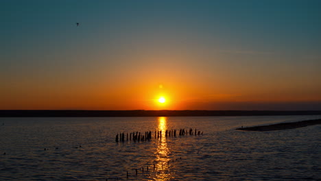 aerial coastline view with calm landscape in background. amazing ocean sunset.