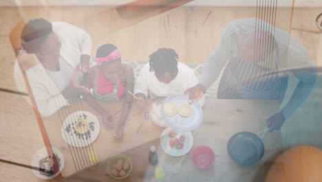 Composite-of-african-american-grandparents-and-grandchildren-preparing-food,-and-ingredients-in-bowl