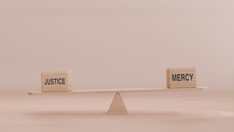 justice and mercy balancing on seesaw