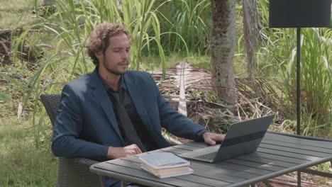 business man working outdoors in bali