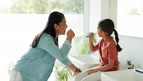 Mother,-high-five-or-kid-in-bathroom-brushing