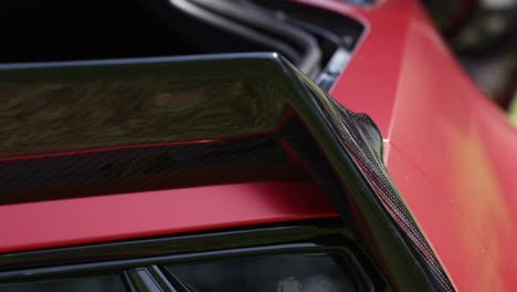 carbon fiber taillight of a red chevrolet corvette car