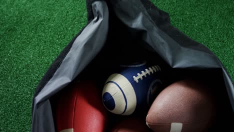 American-footballs-in-bag-4k