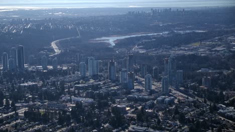 aerial of vancouver urban area with suburbs and skyscraper buildings